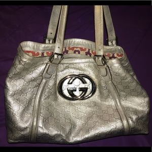Authentic Gucci metallic silver GG logo handbag